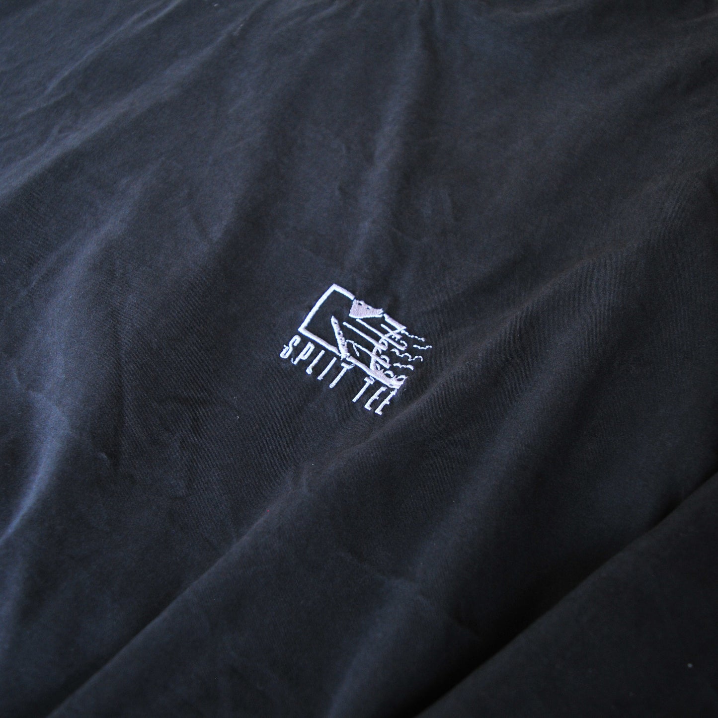 USED SPLIT TEE